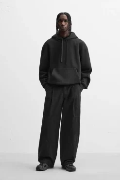 PANTALÓN RELAXED FIT PLIEGUES