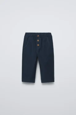 PANTALÓN SARGA BOLSILLOS