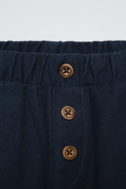 PANTALÓN SARGA BOLSILLOS