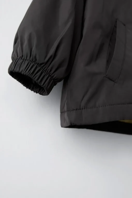 PARKA LIGERA ETIQUETA