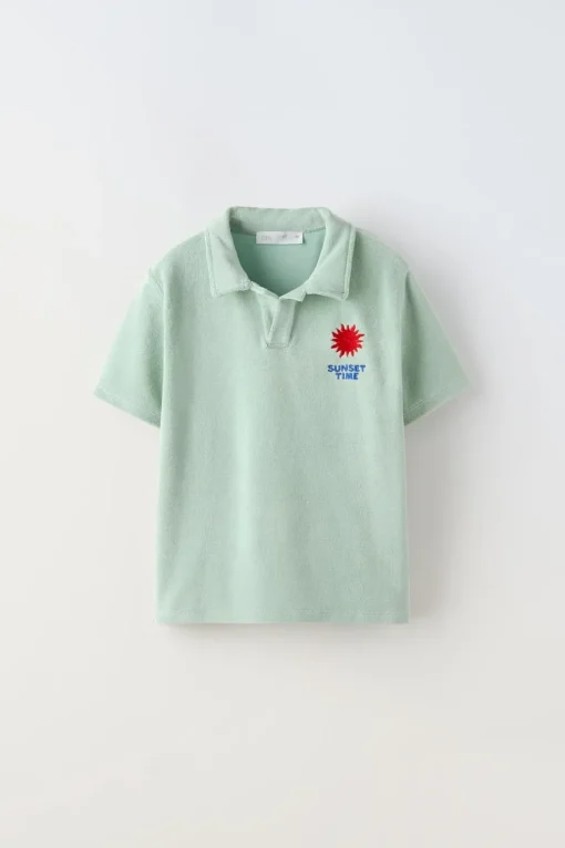 POLO TOALLA BORDADO SOL