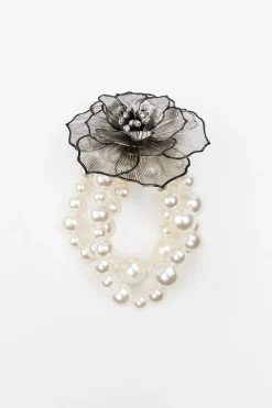 PULSERA PERLAS FLOR BRILLOS