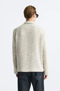SOBRECAMISA ESTRUCTURA BOLSILLOS