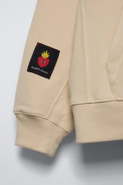 SUDADERA CAPUCHA X RICARDO CAVOLO