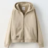SUDADERA CREMALLERA LAVADA ETIQUETA