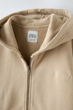 SUDADERA CREMALLERA LAVADA ETIQUETA