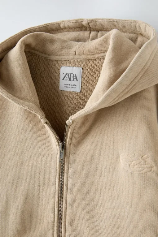 SUDADERA CREMALLERA LAVADA ETIQUETA