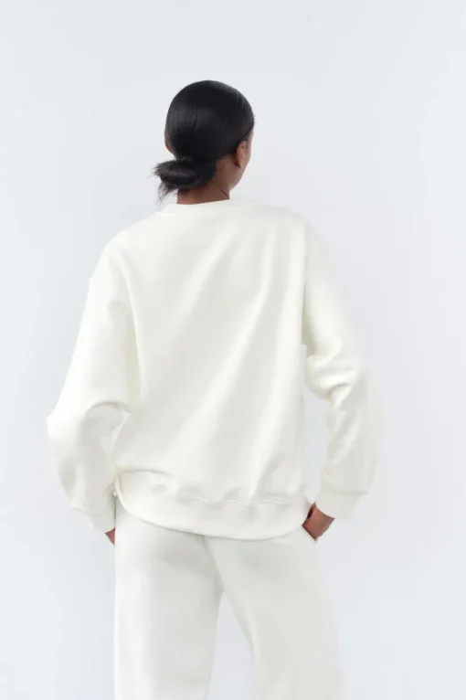 SUDADERA EFECTO LAVADO TEXTO ENGOMADO