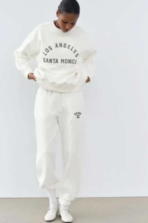 SUDADERA EFECTO LAVADO TEXTO ENGOMADO