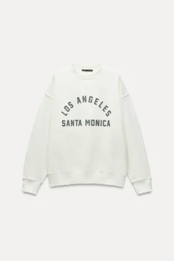 SUDADERA EFECTO LAVADO TEXTO ENGOMADO