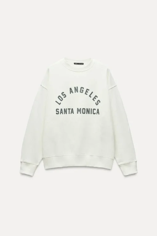 SUDADERA EFECTO LAVADO TEXTO ENGOMADO
