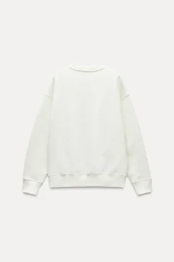 SUDADERA EFECTO LAVADO TEXTO ENGOMADO