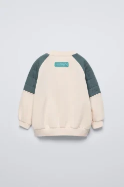 SUDADERA MANGAS ACOLCHADAS