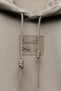SUDADERA OVERSIZE ETIQUETA