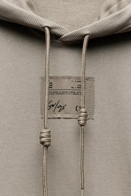SUDADERA OVERSIZE ETIQUETA