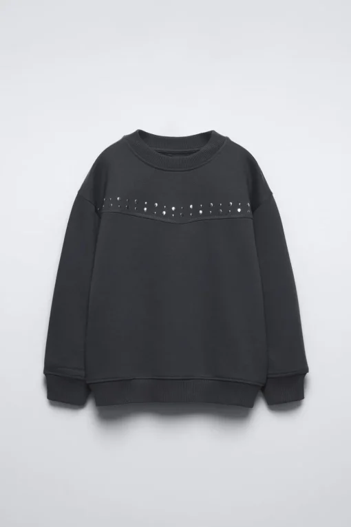 SUDADERA TACHAS