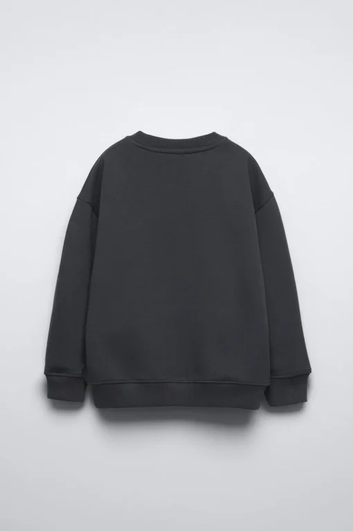 SUDADERA TACHAS