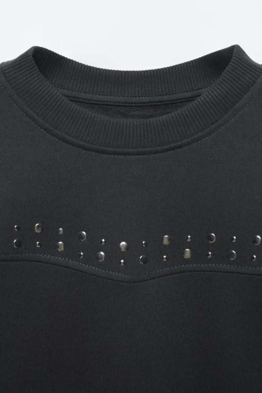 SUDADERA TACHAS