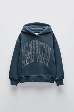 SUDADERA TEXTO STRASS