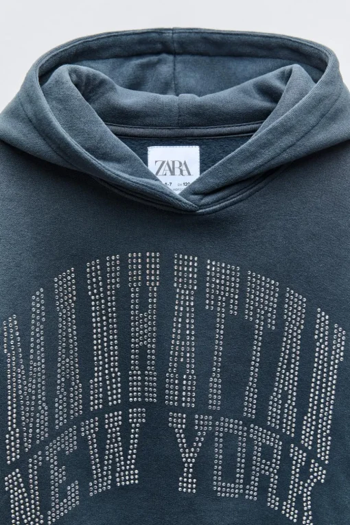 SUDADERA TEXTO STRASS