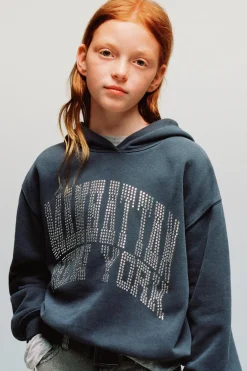 SUDADERA TEXTO STRASS
