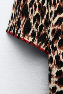 TOP PUNTO ESTAMPADO ANIMAL