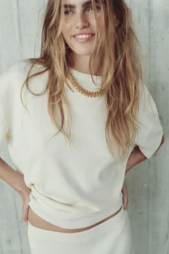 TOP PUNTO LISO OVERSIZE