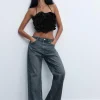 TOP SATINADO HALTER FLOR RELIEVE