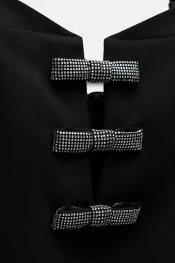 VESTIDO CORTO LAZOS BRILLOS