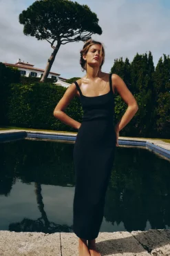 VESTIDO MIDI PUNTO ESPALDA DESCUBIERTA
